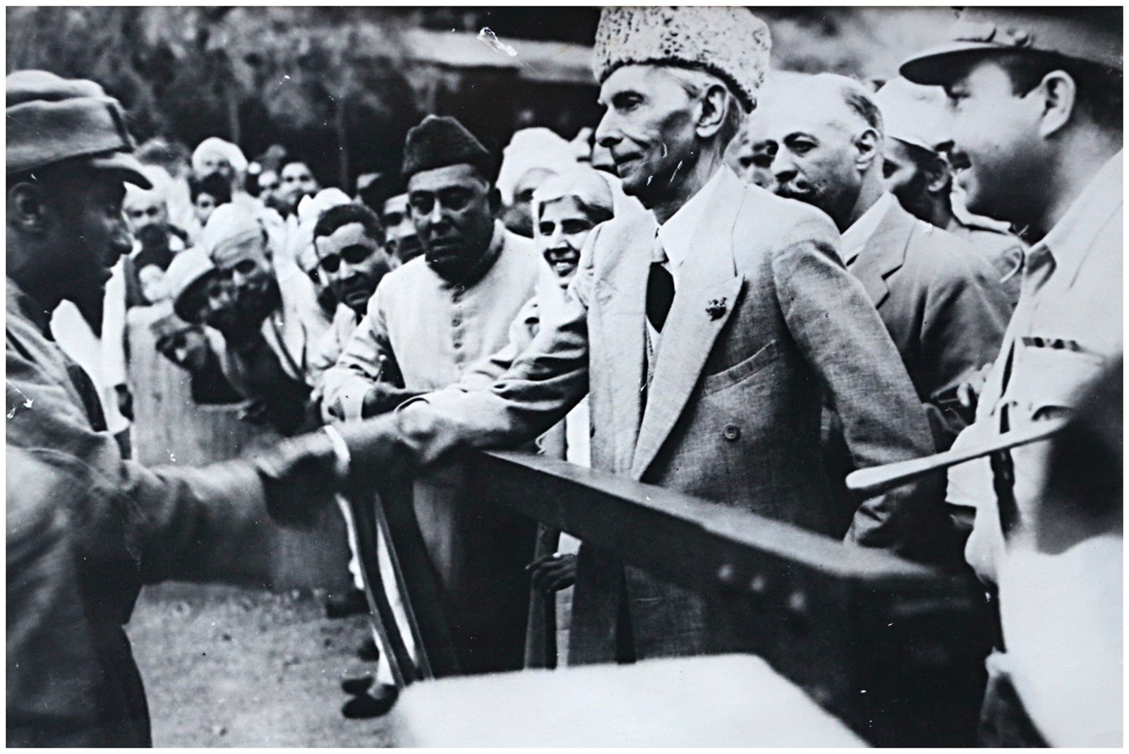 Quaid E Azam shaking hands with an Afghan soldier at Torkham Border