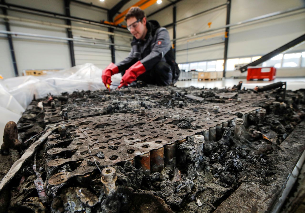 Burnt and Discarded lithium-ion battery - Reuters
